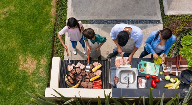 above view of family grilling