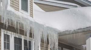 Ice and snow hanging off roof