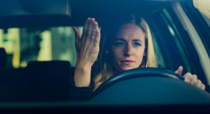 Woman getting upset while driving