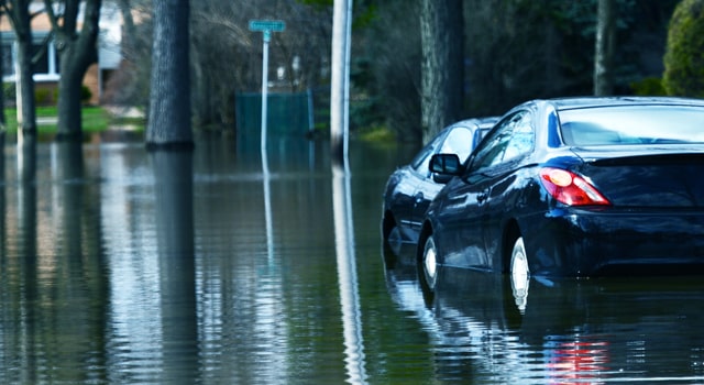 Cars parked on flooded street