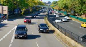 Cars driving up highway