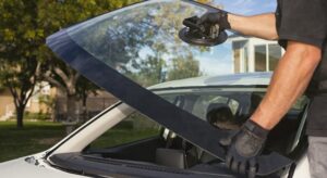 A windshield being replaced that was covered by car insurance.