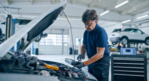 Mechanic inspecting a car