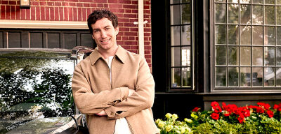 man leaning up against car